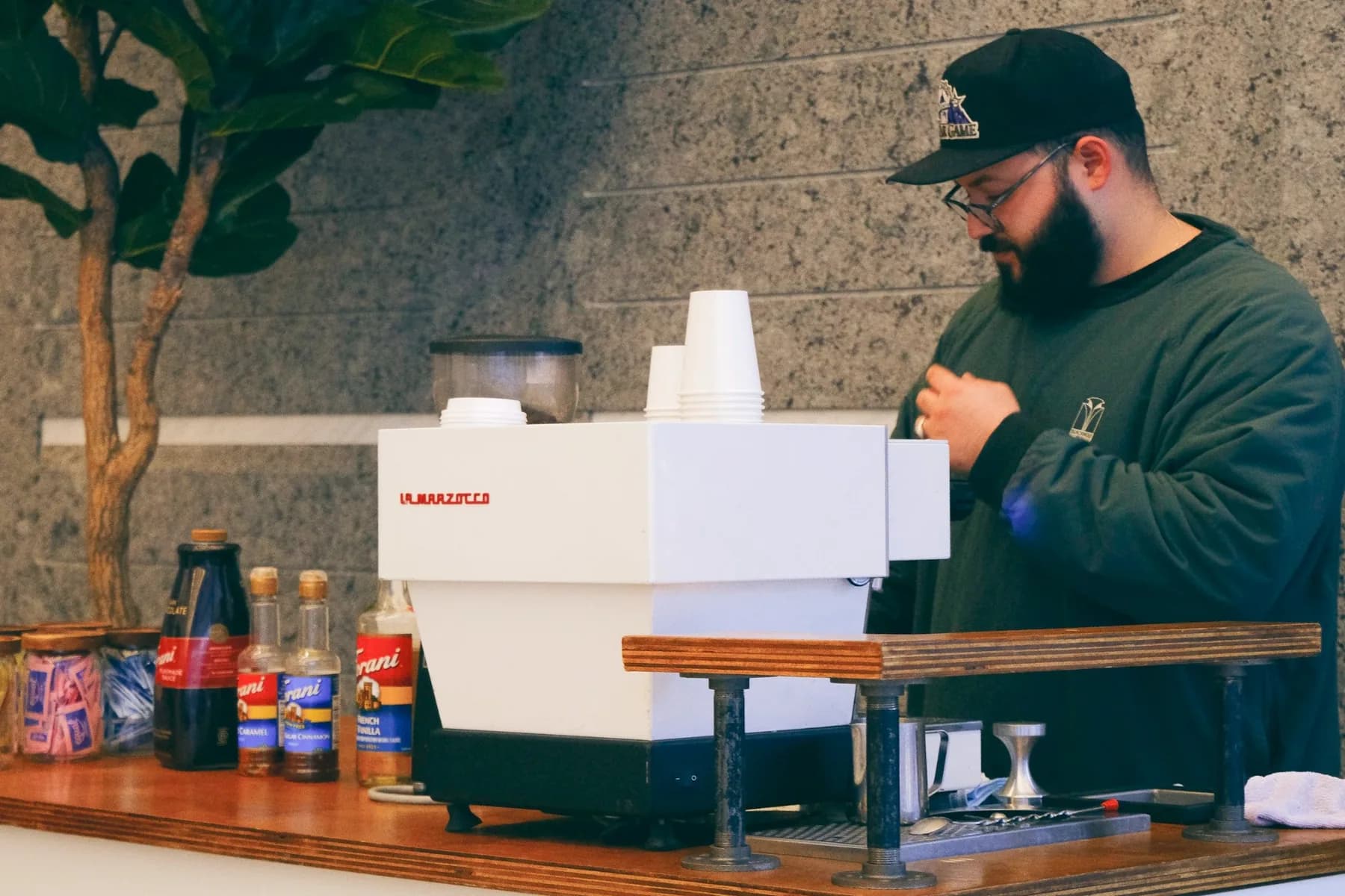The thrd coffee cart and barista in the lobby at Hines 321 N Clark