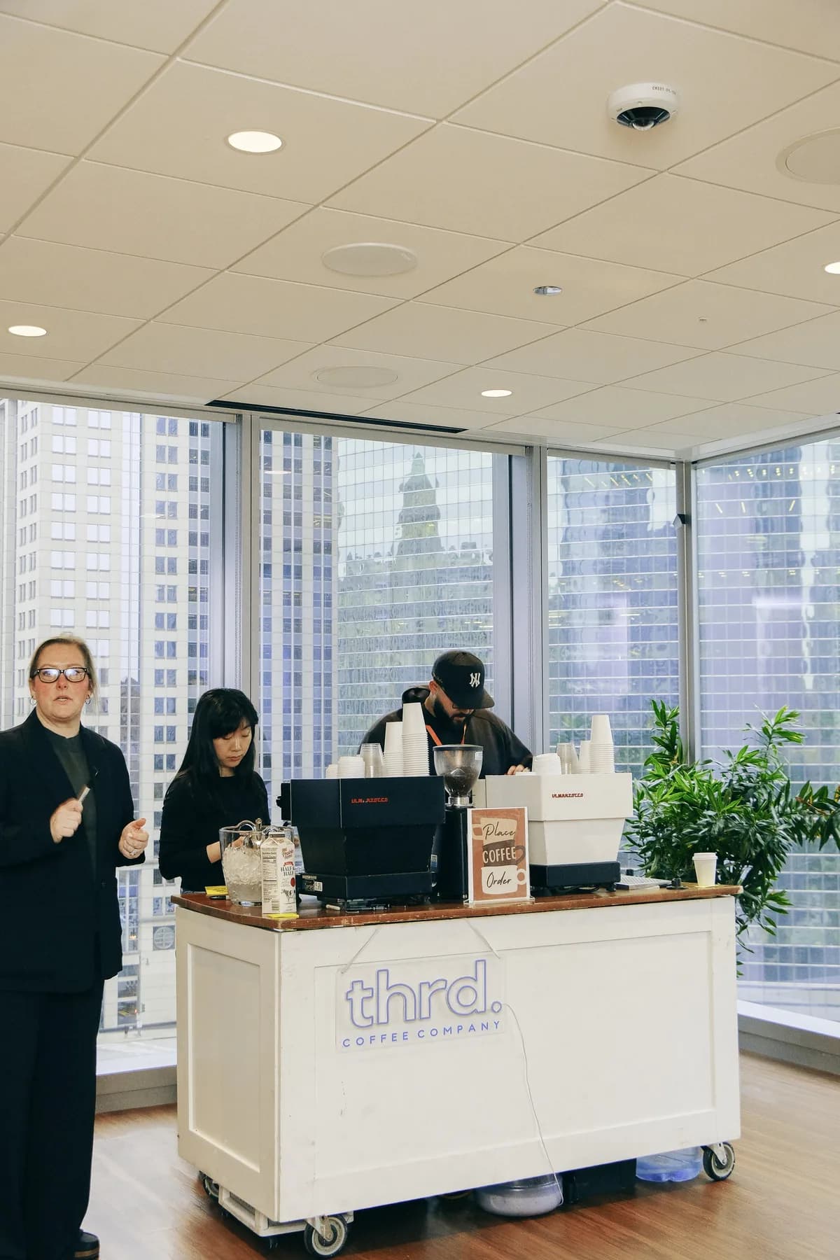 The thrd coffee cart set up by the windows at the Salesforce office event